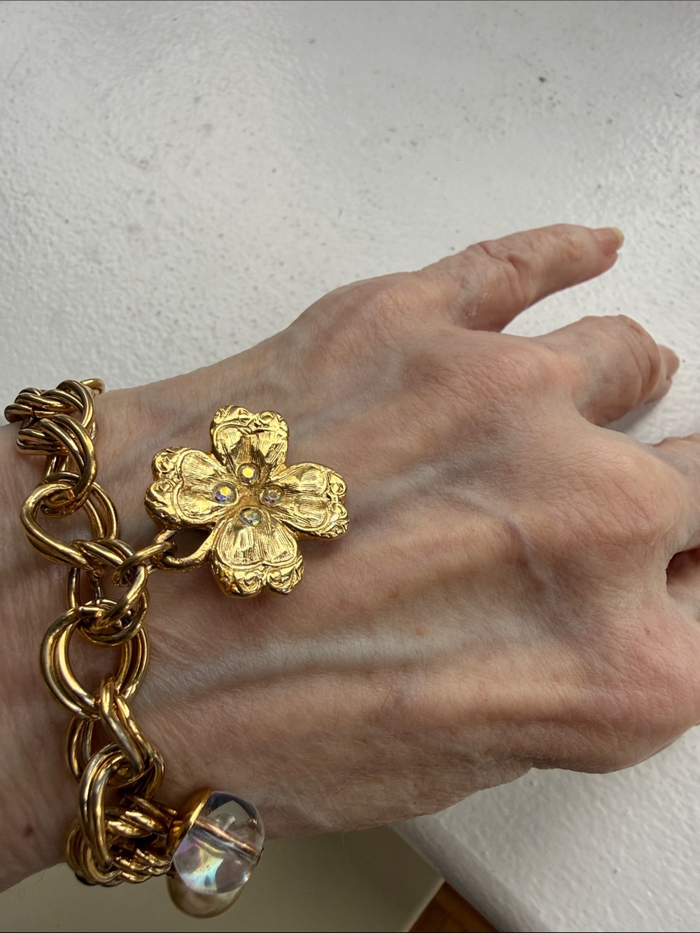 Chunky Gold Tone Open Link Bracelet with 6 Charms & a Toggle Clasp.